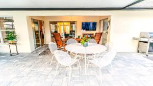 Μια τηλεόραση ή/και κέντρο ψυχαγωγίας στο Unwind in Paradise +136 φωτογραφίες