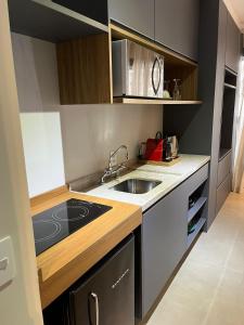 Køkken eller tekøkken på Studio próx metrô Oscar Freire