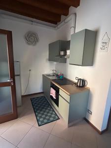 Kuchyň nebo kuchyňský kout v ubytování Aparthotel San Valentino