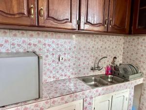 Kuchyň nebo kuchyňský kout v ubytování Appartement meublé cosy - Brazzaville