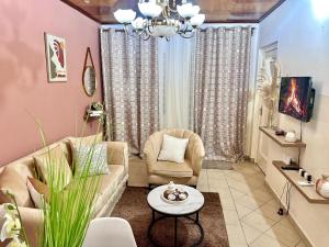 Posezení v ubytování Appartement meublé cosy - Brazzaville