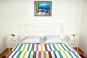 Ένα ή περισσότερα κρεβάτια σε δωμάτιο στο Gonzalez