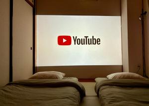 En eller flere senge i et værelse på FUJI Forest House103