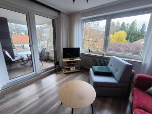 Posezení v ubytování NEU! Innenstadt inklusive Bettwäsche und Handtüchern, Kaffeevollautomat + 15 fotografií