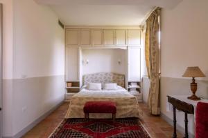 Ένα ή περισσότερα κρεβάτια σε δωμάτιο στο Mater Matuta