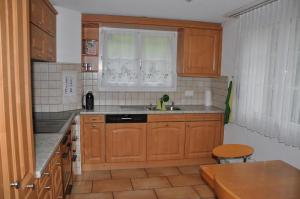 Η κουζίνα ή μικρή κουζίνα στο Hof Sagenmattli +7 φωτογραφίες