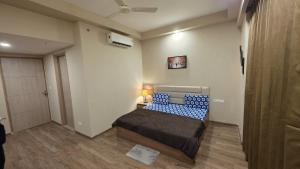 Ένα ή περισσότερα κρεβάτια σε δωμάτιο στο Restful Retreat