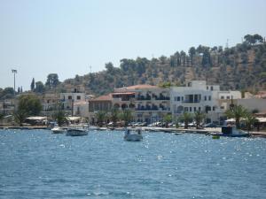a group of boats in a body of water at Bissias Guest House in Galatas