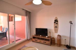 TV a/nebo společenská místnost v ubytování Wohnung Vista Al Mar