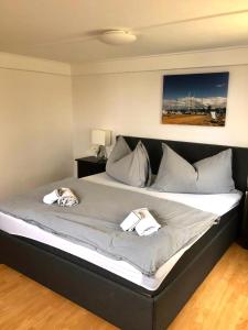 Ένα ή περισσότερα κρεβάτια σε δωμάτιο στο Apartment Romanshorn Von Swisspartments