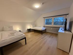 Postel nebo postele na pokoji v ubytování Gemütliche Wohnung