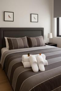 Giường trong phòng chung tại Apartamento Greta Río CalleCalle