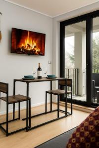 TV/trung tâm giải trí tại Apartamento Greta Río CalleCalle