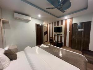 Ένα ή περισσότερα κρεβάτια σε δωμάτιο στο Mount View