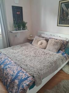 Ένα ή περισσότερα κρεβάτια σε δωμάτιο στο Apartment Baci for 4 guests