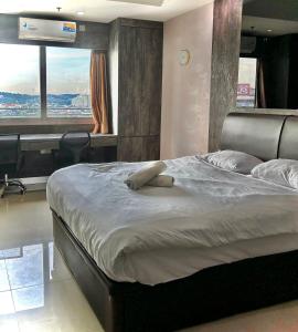 Postel nebo postele na pokoji v ubytování Nagoya Mansion Residence with City View