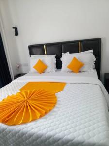 Ένα ή περισσότερα κρεβάτια σε δωμάτιο στο Jambo inn Apartment