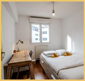 En eller flere senge i et værelse på Chez Morgane I T3 I Annemasse