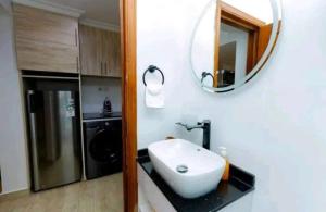 Ένα μπάνιο στο Jambo inn Apartment