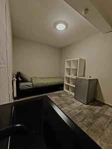 Ένα ή περισσότερα κρεβάτια σε δωμάτιο στο Le Berkane