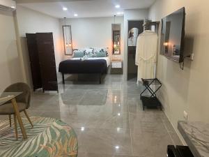 Un pat sau paturi într-o cameră la Puerta Negra