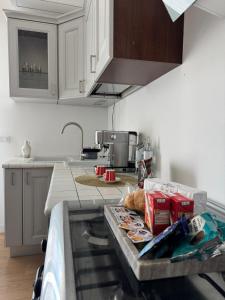 a kitchen with a counter with food on it at IELLE Suite Brutia in Cosenza