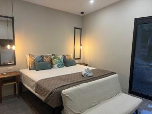 Un pat sau paturi într-o cameră la Puerta Negra