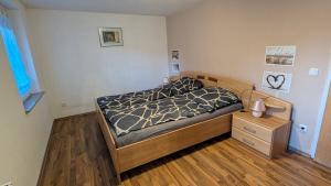 Postel nebo postele na pokoji v ubytování Ferienwohnung Rössger