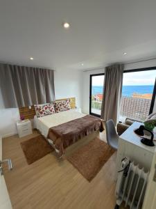 Postel nebo postele na pokoji v ubytování Vivenda Silva