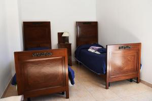 Postel nebo postele na pokoji v ubytování Il papavero rosso + 1 fotografie