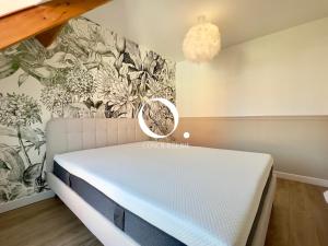 Giường trong phòng chung tại COC - La Dune