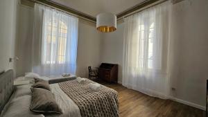 Ένα ή περισσότερα κρεβάτια σε δωμάτιο στο Tower Rooms