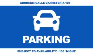 a sign that reads parking with a white car at MalagadeVacaciones - Atico victoria in Málaga