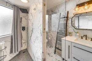 a bathroom with a shower and a sink at Work and Relax! Updated Walnut Creek Home with Office in Walnut Creek +23 photos
