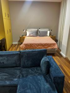 Postel nebo postele na pokoji v ubytování AETHER-Living Apartments