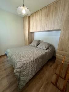 Postel nebo postele na pokoji v ubytování Proche centre-ville joli appartement 2p