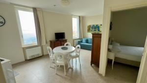 Ένα ή περισσότερα κρεβάτια σε δωμάτιο στο I Rioni di Perugia