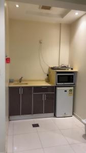 Η κουζίνα ή μικρή κουζίνα στο Apartment in Dammam Al Jawhara Self-Check-in - Special Location