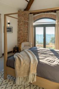 Ένα ή περισσότερα κρεβάτια σε δωμάτιο στο Borgo Luna Rossa