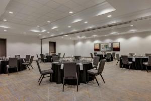 a conference room with tables and chairs in it at Chicago Marriott Midway in Bedford Park +48 photos