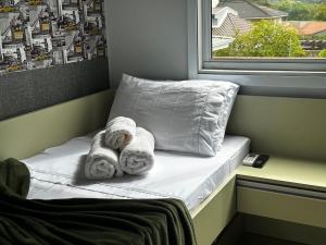 Ένα ή περισσότερα κρεβάτια σε δωμάτιο στο Sobrado Triplex Premium Próximo Aeroporto São José dos Pinhais Curitiba