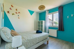 Ένα ή περισσότερα κρεβάτια σε δωμάτιο στο Maison Tulipe 3Ch +23 φωτογραφίες