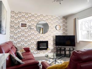 TV a/nebo společenská místnost v ubytování No 2 Railway Cuttings - Uk3402