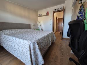 Ένα ή περισσότερα κρεβάτια σε δωμάτιο στο Casa Joy