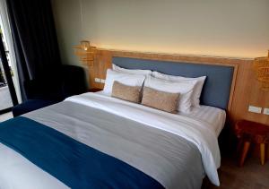 Postel nebo postele na pokoji v ubytování La La Lay Beach House