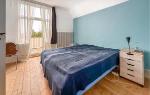 Postel nebo postele na pokoji v ubytování Amazing Home In Gudhjem With Wifi + 16 fotografií