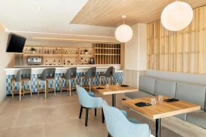 Χώρος καθιστικού στο AC Hotel by Marriott San Luis Potosi