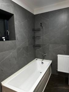 Koupelna v ubytování Apartament