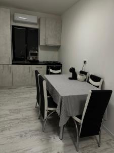 Kuchyň nebo kuchyňský kout v ubytování Apartament