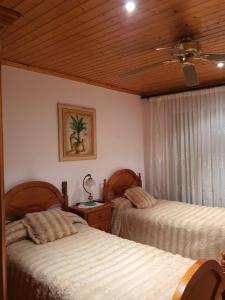 Postel nebo postele na pokoji v ubytování Casa vitorianet